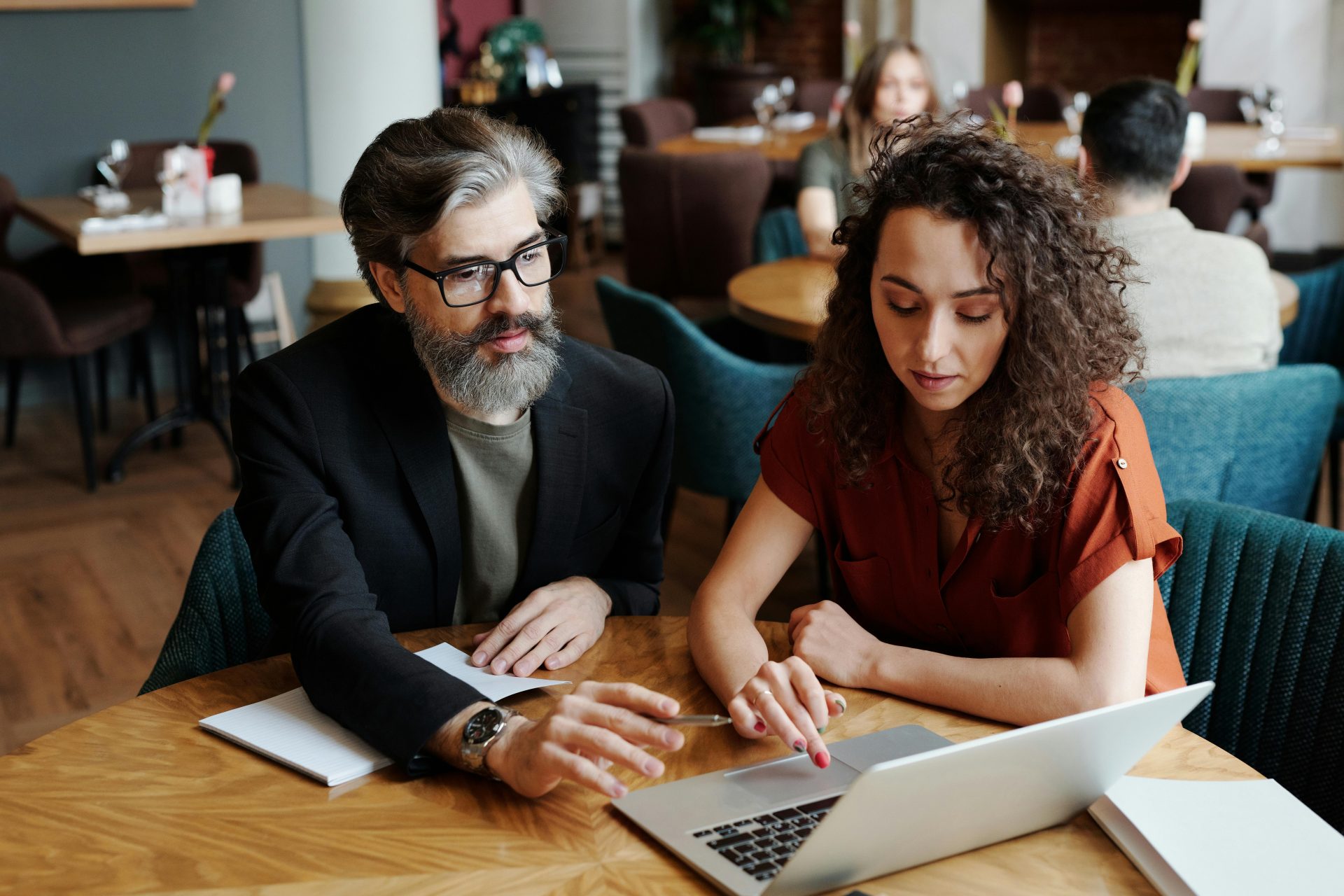 Man and Woman Having Discussion About Work